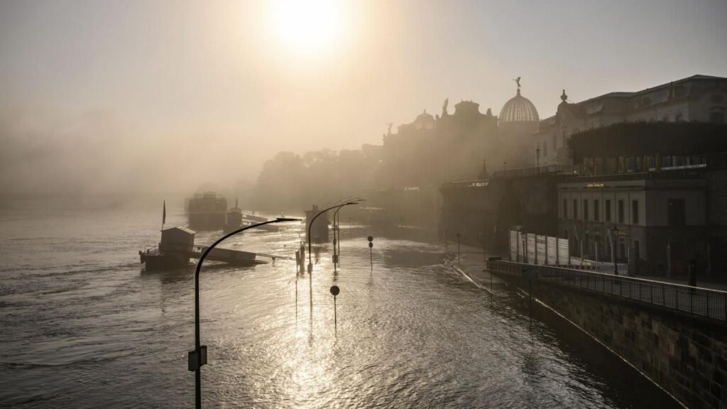 EU warns deadly flooding and wildfires show climate breakdown is fast becoming the norm