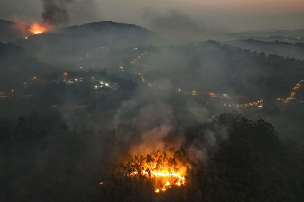 AP PHOTOS: Hallmarks of climate change seen in floods, fires and drought around the globe